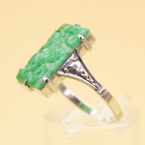 40 - Carved Jade Panel Set Ring Mounted on 9 Carat White Gold Band Diamond Set Shoulders Ring Size N and ... 
