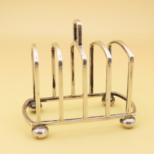 445 - Silver Bachelor Four Slice Toast Rack 8cm Long x 6cm High