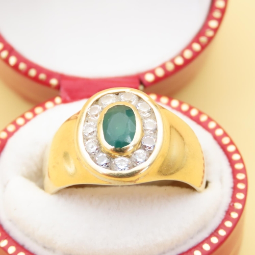 451 - Emerald and Diamond Cluster Ring Rubover Set Mounted on 18 Carat Yellow Gold Band Ring Size L and a ... 