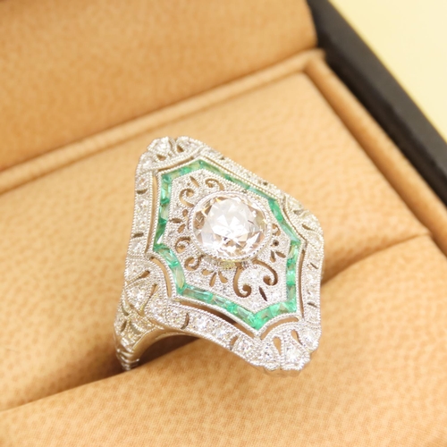 456 - Ladies Emerald and Diamond Ring Mounted on Platinum Intricately Detailed Band Size N