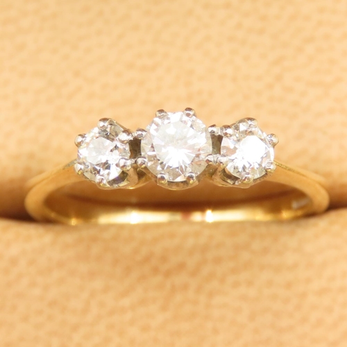 466 - Three Stone Diamond Ring Mounted in White Gold Further Mounted on 18 Carat Yellow Gold Band Ring Siz... 