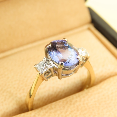 467 - Ladies Tanzanite Centerstone Ring Further Decorated with Diamonds to Shoulders Mounted on 18 Carat Y... 