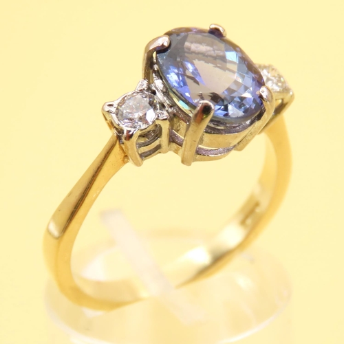 467 - Ladies Tanzanite Centerstone Ring Further Decorated with Diamonds to Shoulders Mounted on 18 Carat Y... 