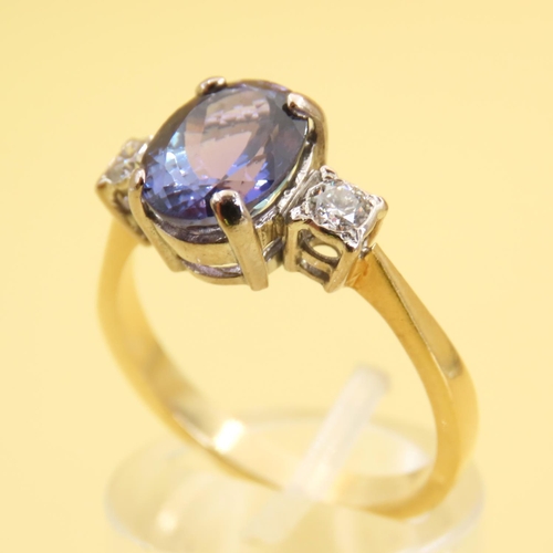 467 - Ladies Tanzanite Centerstone Ring Further Decorated with Diamonds to Shoulders Mounted on 18 Carat Y... 