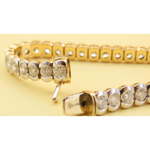 470 - Ladies Tennis Form Diamond Bracelet of Approximately 11 Carats of Diamonds Set in 18 Carat Yellow Go... 