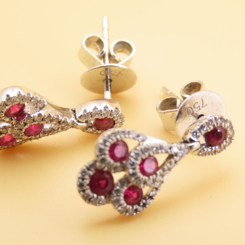 56 - Pair of Ruby and Diamond 18 Carat White Gold Mounted Earrings Attractively Detailed Each 2cm Drop