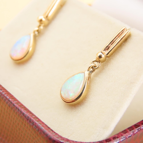 58 - Pair of Opal Set Articulated Form Drop Earrings Set in 9 Carat Yellow Gold Each 2cm Drop