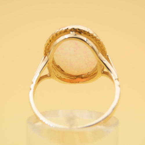 62 - Opal Centerstone Ring Mounted on 9 Carat Yellow Gold Band Ring Size P