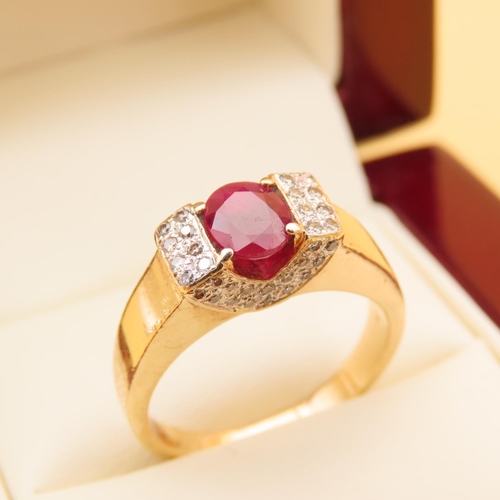 68 - Ruby Centerstone Ring Flanked with Eight Diamonds to Each Side Four Claw Set Mounted on 9 Carat Yell... 