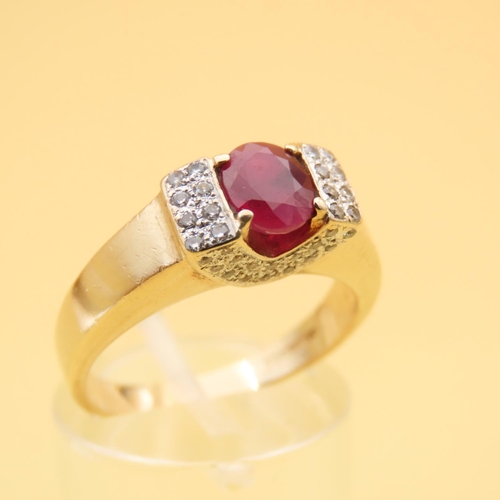 68 - Ruby Centerstone Ring Flanked with Eight Diamonds to Each Side Four Claw Set Mounted on 9 Carat Yell... 