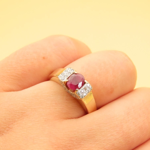 68 - Ruby Centerstone Ring Flanked with Eight Diamonds to Each Side Four Claw Set Mounted on 9 Carat Yell... 