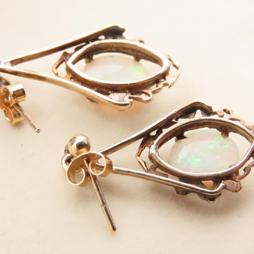 7 - Pair of Opal Set 9 Carat Yellow Gold Drop Earrings Attractively Detailed Each 3cm Drop