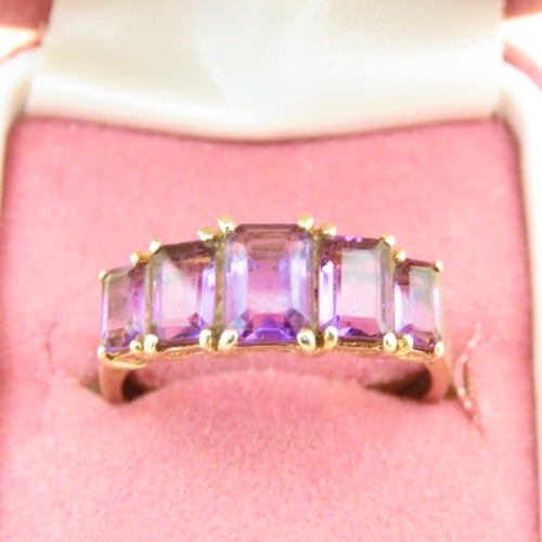 80 - Amethyst Five Stone Ring Graduated Form Each Stone Four Claw Set Mounted on 9 Carat Yellow Gold Band... 