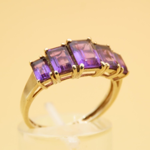 80 - Amethyst Five Stone Ring Graduated Form Each Stone Four Claw Set Mounted on 9 Carat Yellow Gold Band... 