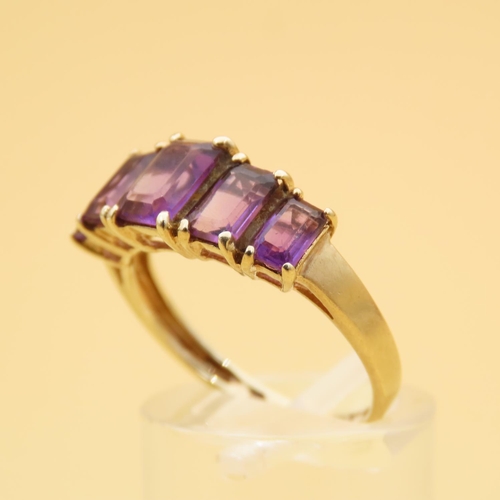 80 - Amethyst Five Stone Ring Graduated Form Each Stone Four Claw Set Mounted on 9 Carat Yellow Gold Band... 