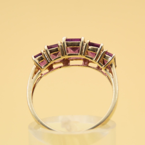 80 - Amethyst Five Stone Ring Graduated Form Each Stone Four Claw Set Mounted on 9 Carat Yellow Gold Band... 