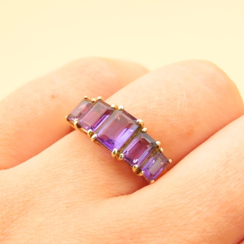 80 - Amethyst Five Stone Ring Graduated Form Each Stone Four Claw Set Mounted on 9 Carat Yellow Gold Band... 