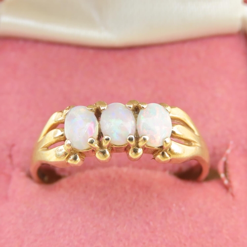 88 - Opal Three Stone Ring Mounted on 9 Carat Yellow Gold Band Ring Size R