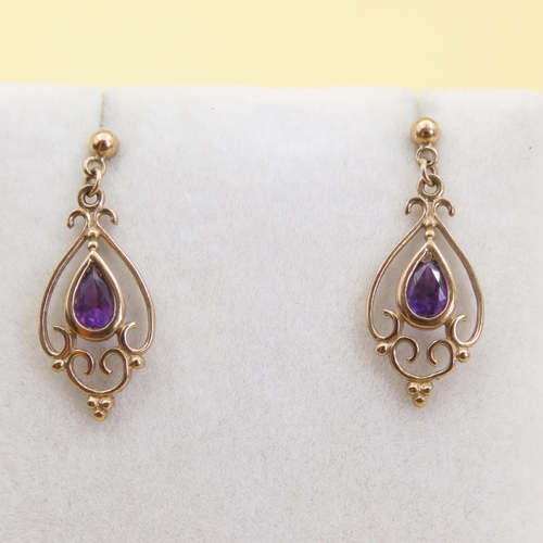 1022 - Pair of Amethyst Set Ladies 9 Carat Yellow Gold Earrings Each 2cm High