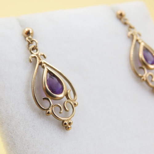 1022 - Pair of Amethyst Set Ladies 9 Carat Yellow Gold Earrings Each 2cm High