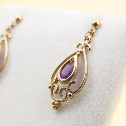 1022 - Pair of Amethyst Set Ladies 9 Carat Yellow Gold Earrings Each 2cm High