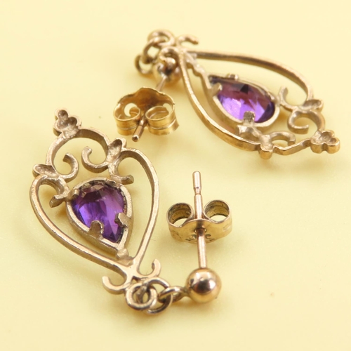 1022 - Pair of Amethyst Set Ladies 9 Carat Yellow Gold Earrings Each 2cm High