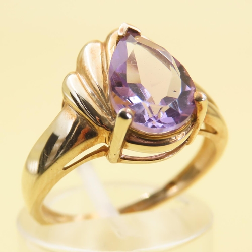 1024 - Designer Amethyst Centerstone Ring Mounted on 9 Carat Yellow Gold Band Size N