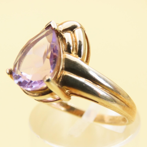 1024 - Designer Amethyst Centerstone Ring Mounted on 9 Carat Yellow Gold Band Size N