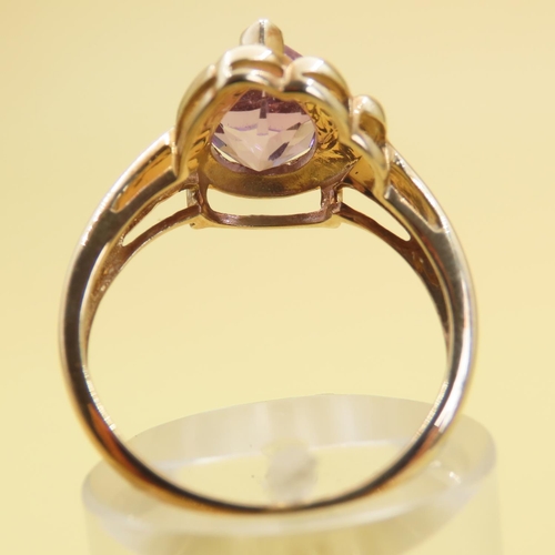 1024 - Designer Amethyst Centerstone Ring Mounted on 9 Carat Yellow Gold Band Size N