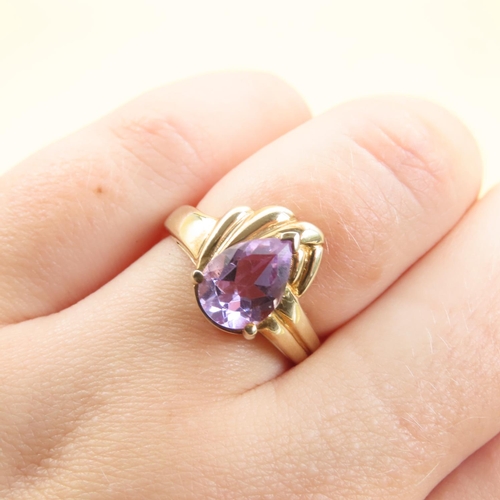 1024 - Designer Amethyst Centerstone Ring Mounted on 9 Carat Yellow Gold Band Size N