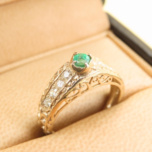 1027 - Emerald and Diamond Set Ring Mounted on 9 Carat Yellow Gold Band Size O