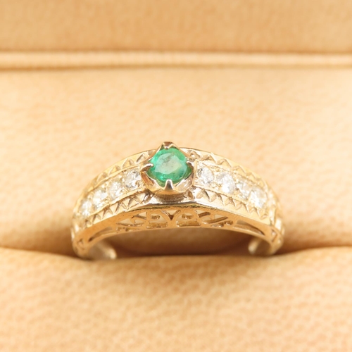 1027 - Emerald and Diamond Set Ring Mounted on 9 Carat Yellow Gold Band Size O