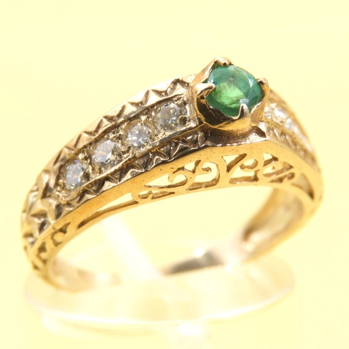 1027 - Emerald and Diamond Set Ring Mounted on 9 Carat Yellow Gold Band Size O