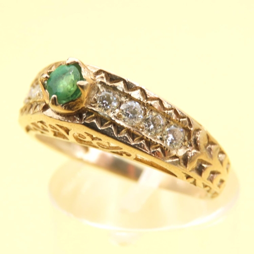 1027 - Emerald and Diamond Set Ring Mounted on 9 Carat Yellow Gold Band Size O