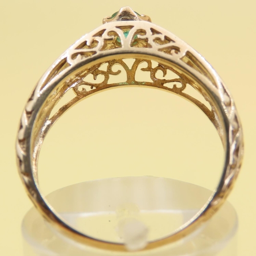 1027 - Emerald and Diamond Set Ring Mounted on 9 Carat Yellow Gold Band Size O