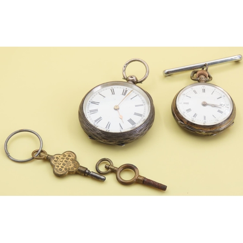 1048 - Two Silver Cased Pocket Watches with Keys