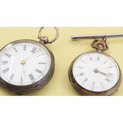 1048 - Two Silver Cased Pocket Watches with Keys