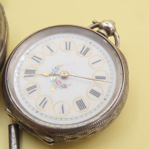 1049 - Two Silver Cased Pocket Watches with Keys