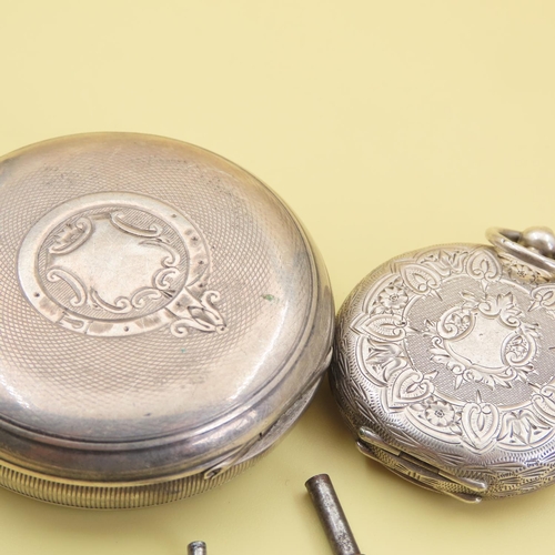 1049 - Two Silver Cased Pocket Watches with Keys