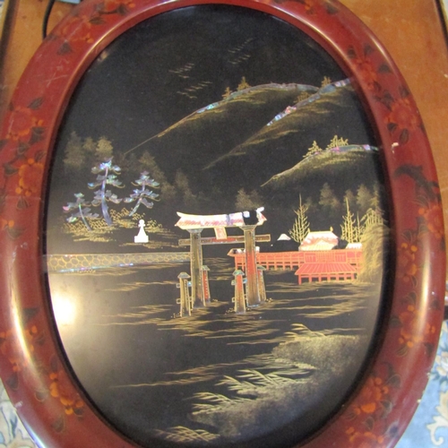 112 - Japanese Lacquerwork Scene Contained within Decorated Red Ground Frame Oval Form Approximately 18 In... 