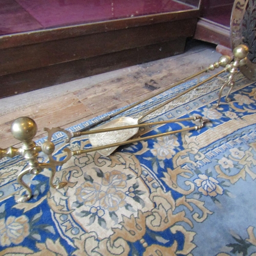 117 - Set of Three Brass Fire Irons with Accompanying Matching Rests