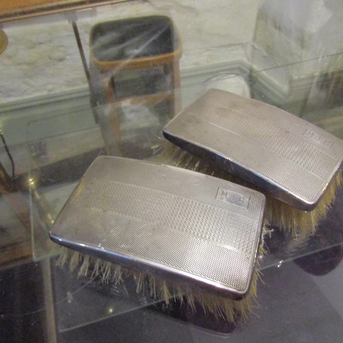 124 - Pair of Silver Mounted Clothes Brushes