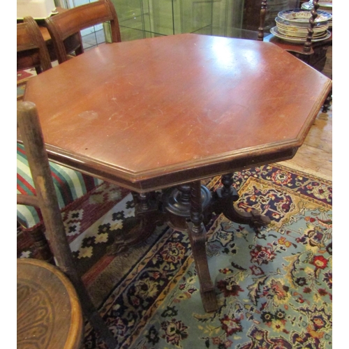 199 - Antique Mahogany Octagonal Form Centre Table Carved Supports Approximately 40 Inches Wide