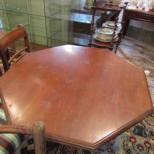 199 - Antique Mahogany Octagonal Form Centre Table Carved Supports Approximately 40 Inches Wide