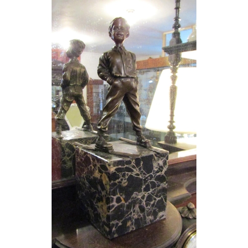 231 - Bronze Sculpture Boy Skier Mounted on Tube Form Marble Base Approximately 9 Inches High