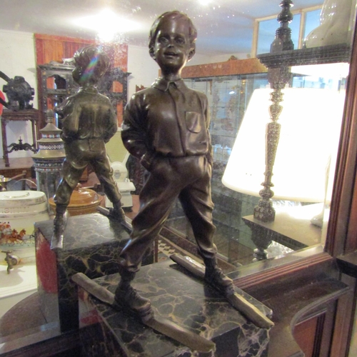 231 - Bronze Sculpture Boy Skier Mounted on Tube Form Marble Base Approximately 9 Inches High