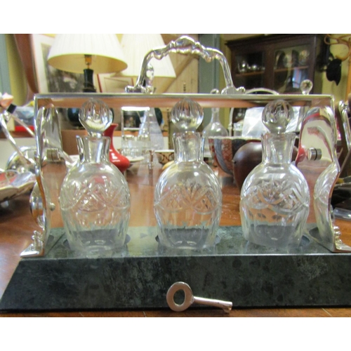 587 - Three Bottle Spirit Decanter Silver Plated with Key Attractively Detailed