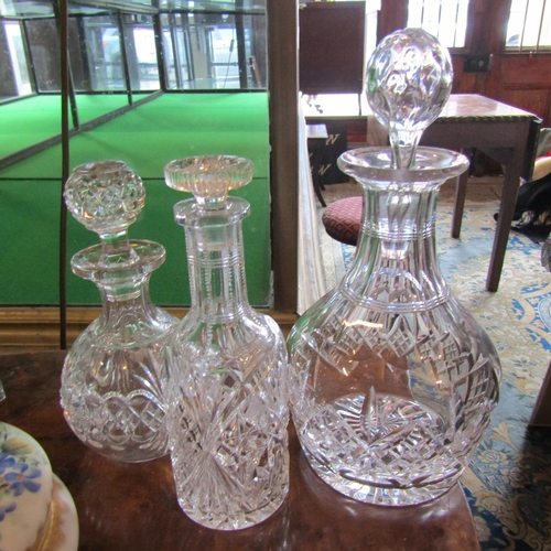 70 - Three Cut Crystal Decanters with Original Stoppers