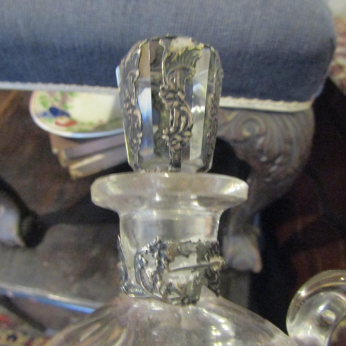 71 - Silver Overlaid Decanter with Original Stopper Approximately 12 Inches High