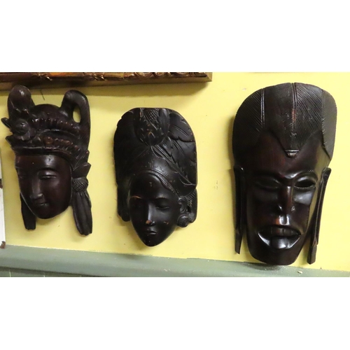 729 - Three Carved Hardwood Eastern Tribal Heads Tallest Approximately 11 Inches High